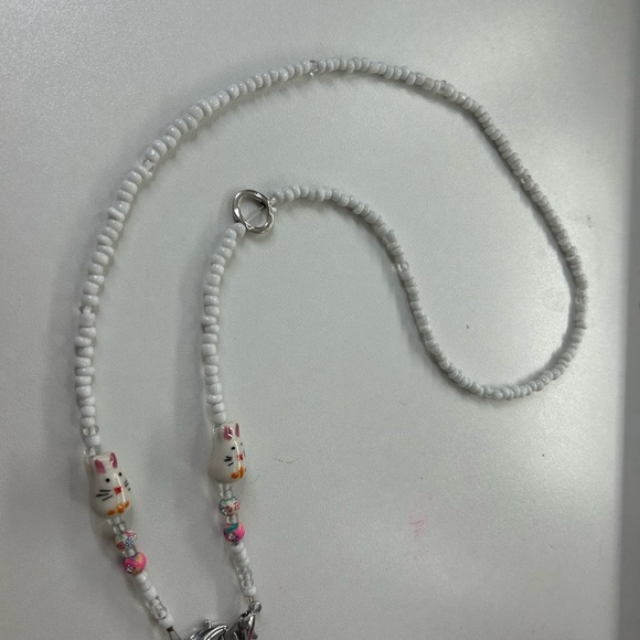 Jewelry - White Beaded eyeglasses chain with springtime bunny